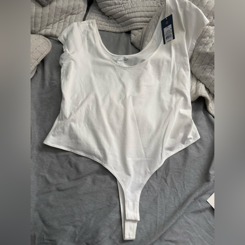 white thong bodysuit